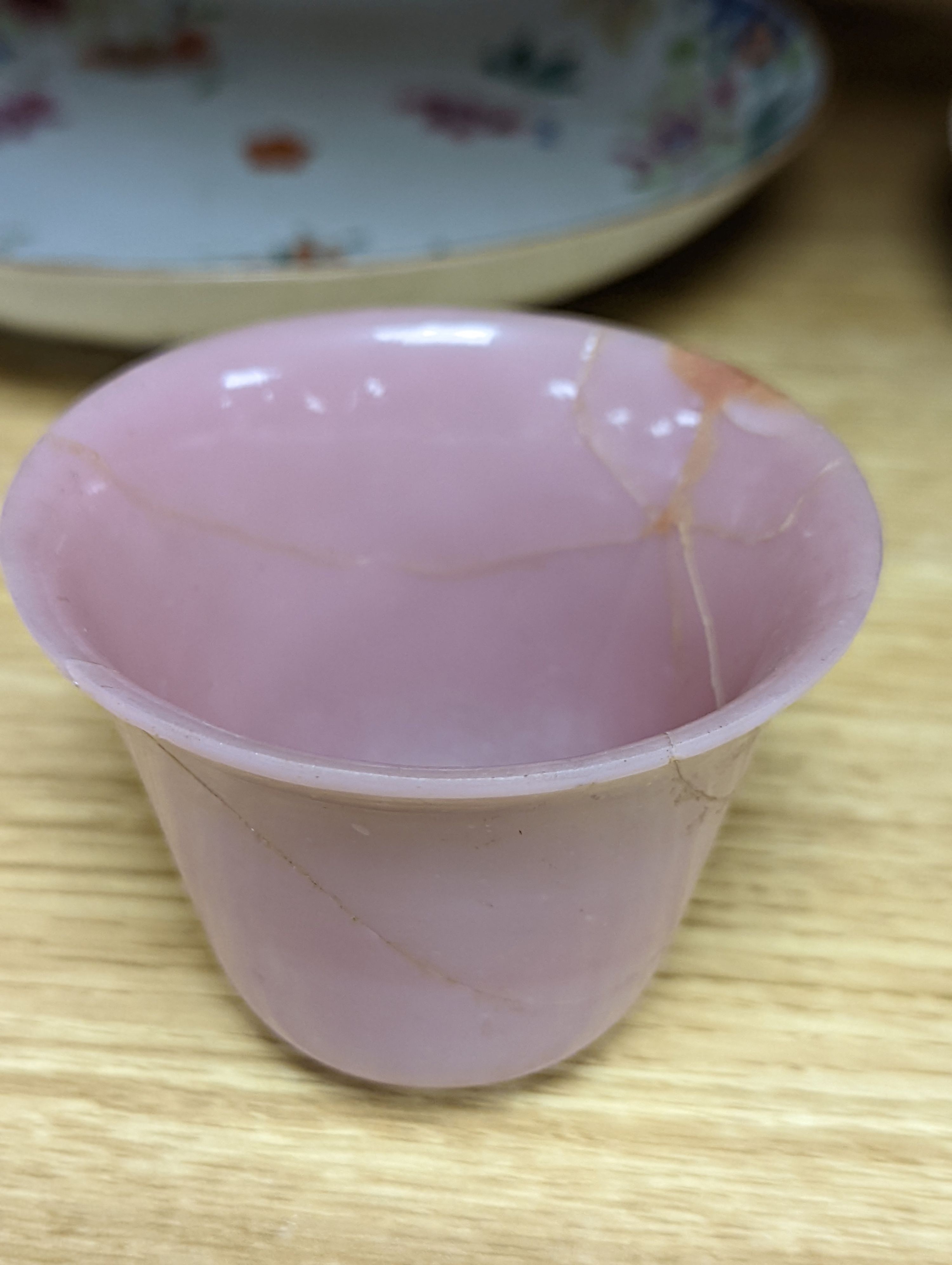 An 18th century Chinese famille rose dish, crackle-glaze stem cup, Beijing glass tea bowl and a Chinese Imari plate. Largest 24cm